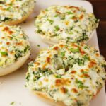 Cheesy Spinach-Artichoke Bagels