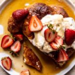 Baked Strawberry and Cream Stuffed Croissant French Toast