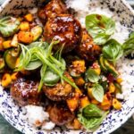 Sweet and Spicy Sesame Meatball Bowl with Mango Cucumber Salad.