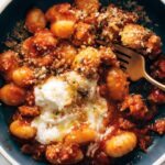 Millionaire Gnocchi with Red Sauce, Herbed Ricotta, and Golden Crispies