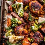 Sheet Pan Curry Butter Chicken with Sweet Potatoes and Tahini
